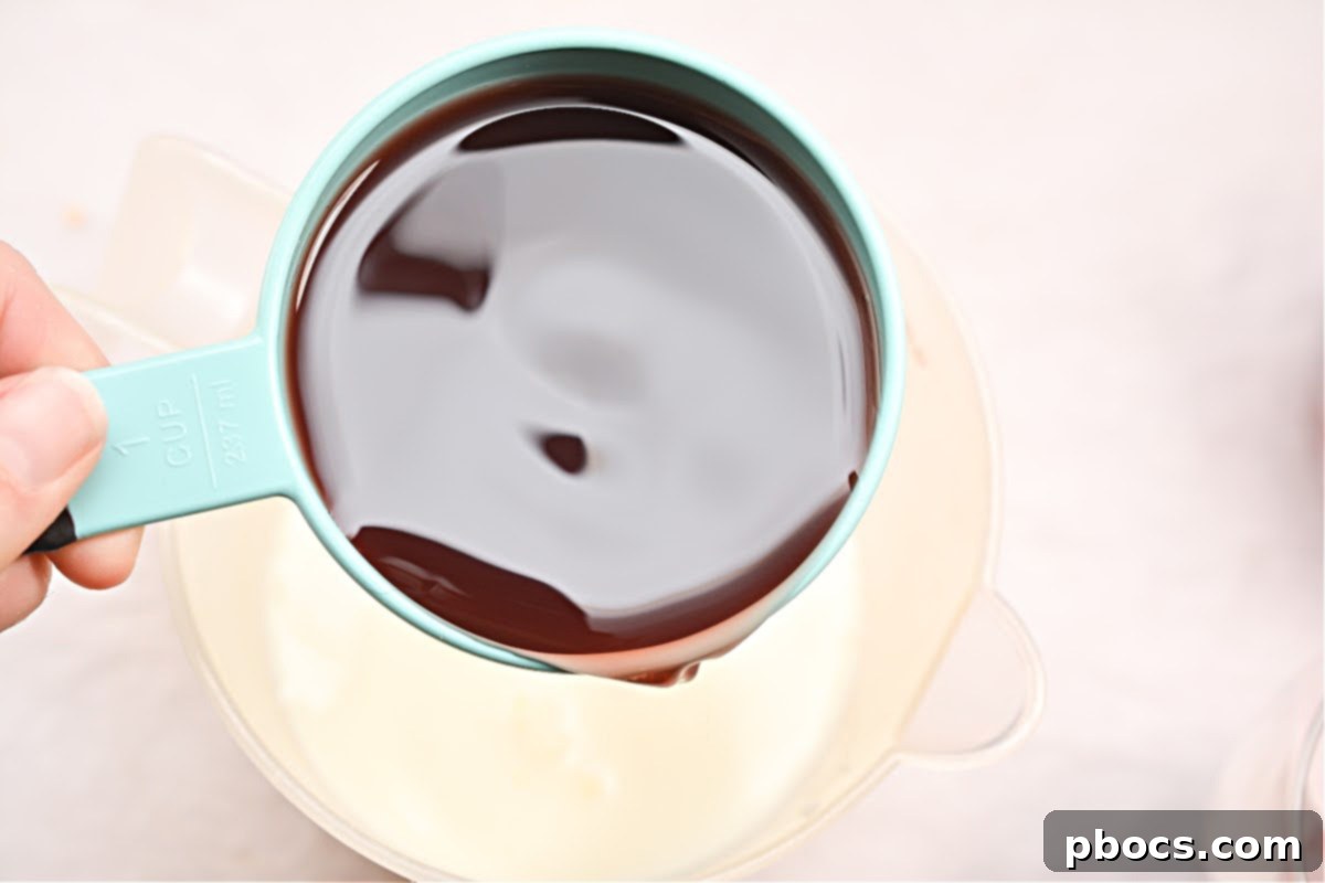 Close-up of mixed liquid ingredients for Keto Pink Drink.