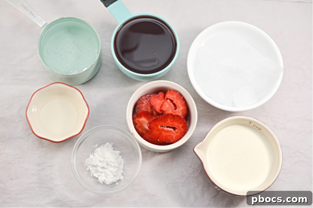 Blending ingredients for Keto Pink Drink with an immersion blender.