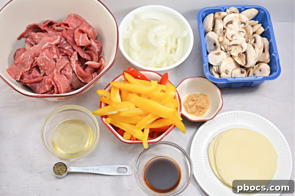 Foil packets filled with delicious Philly Cheesesteak ingredients, ready for cooking on the grill or in the oven