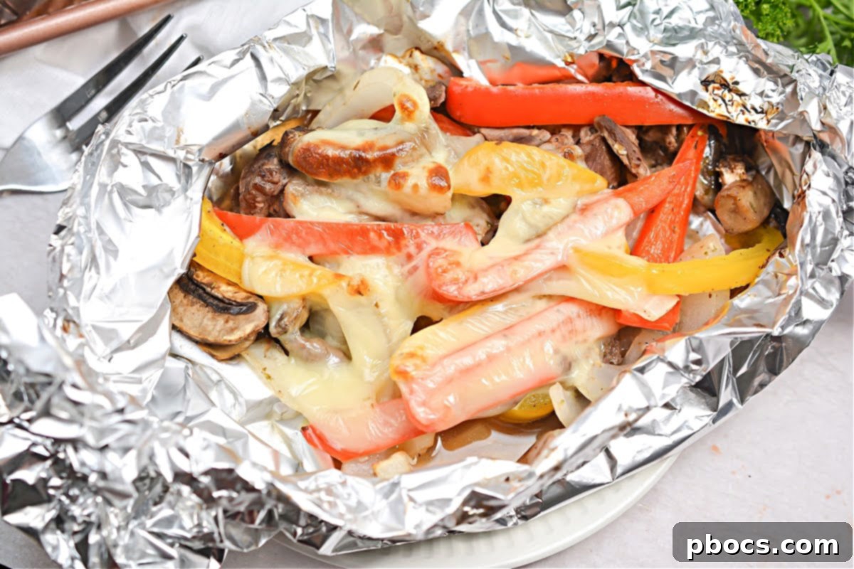 Keto Philly Cheesesteak Foil Packets showing alternative protein options like chicken or pork for a lighter meal