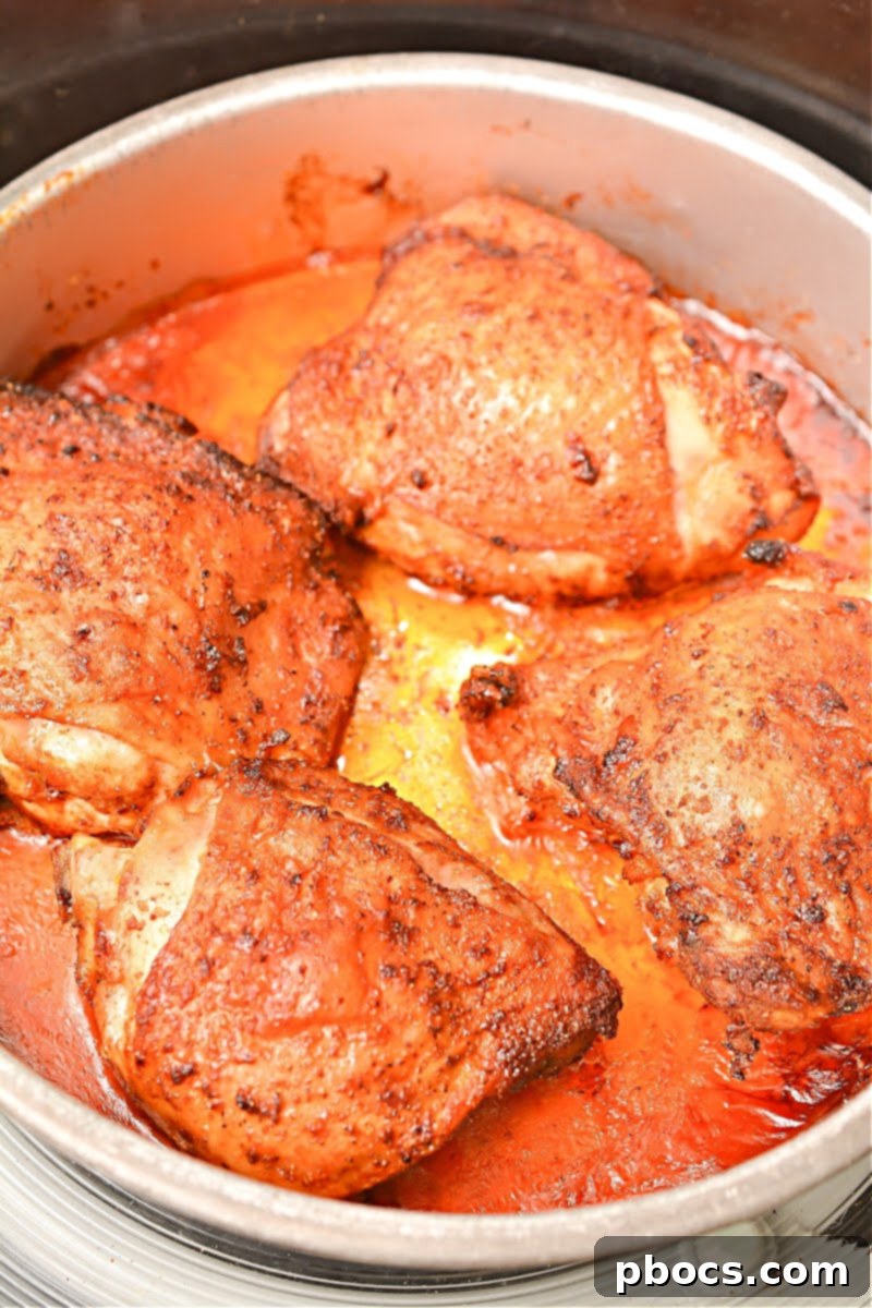 Chicken Thighs in Air Fryer Basket
