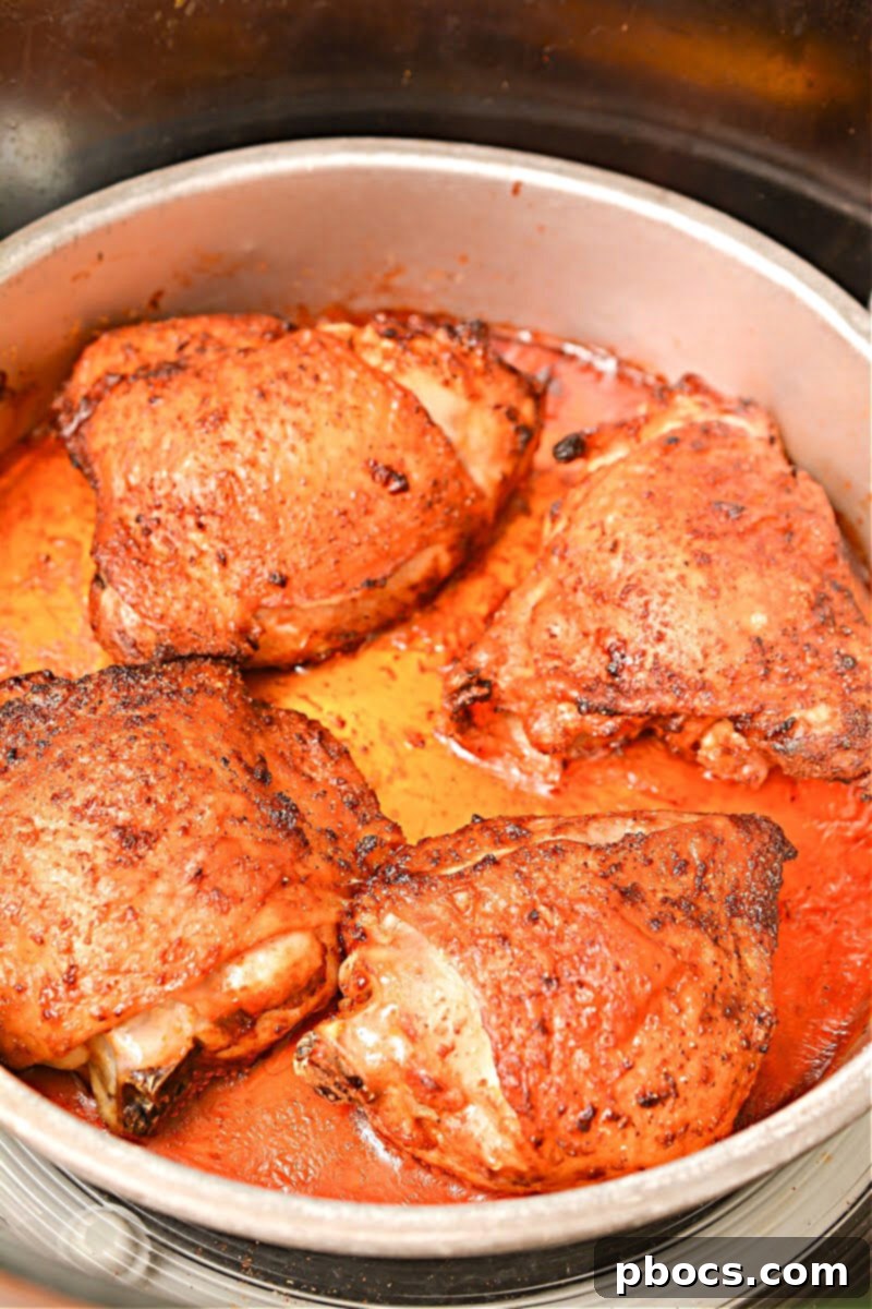 Chicken Thighs Cooking in an Air Fryer