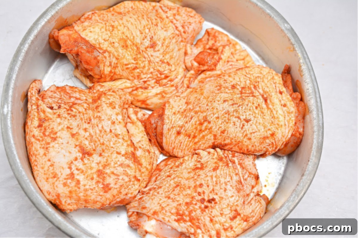 Seasoning Chicken Thighs with Spices