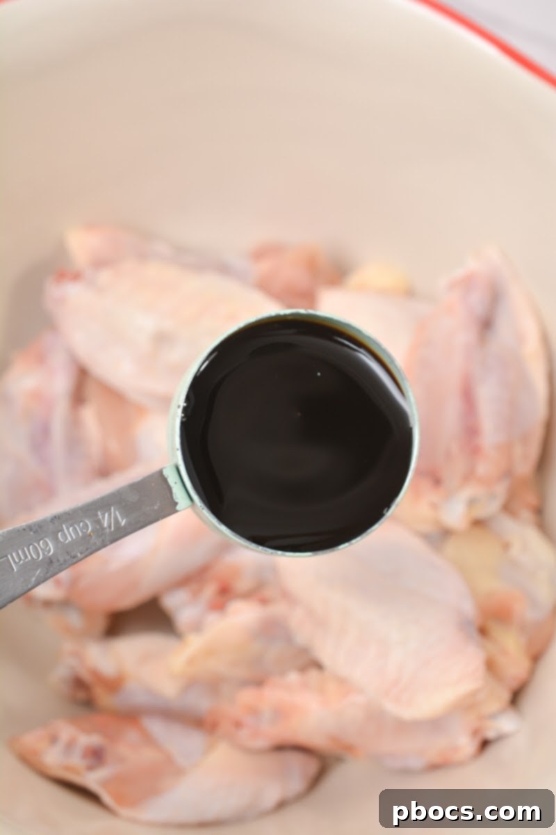 Keto Korean BBQ Chicken Wings - Wings in a mixing bowl