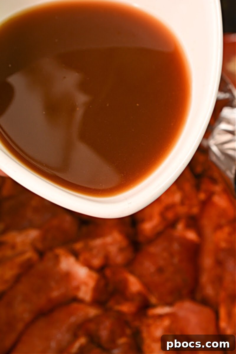 Cajun Keto Oven Ribs 12 Folding sides of foil packet around ribs, leaving top open