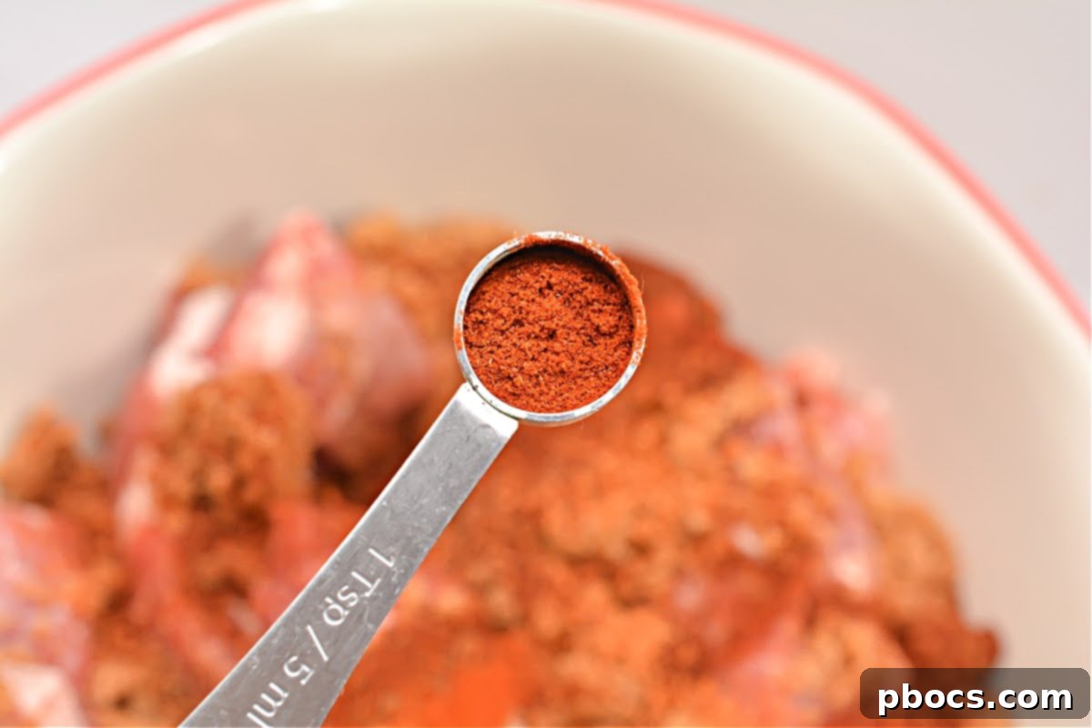 Cajun Keto Oven Ribs 10 Preparing foil packet for baking ribs