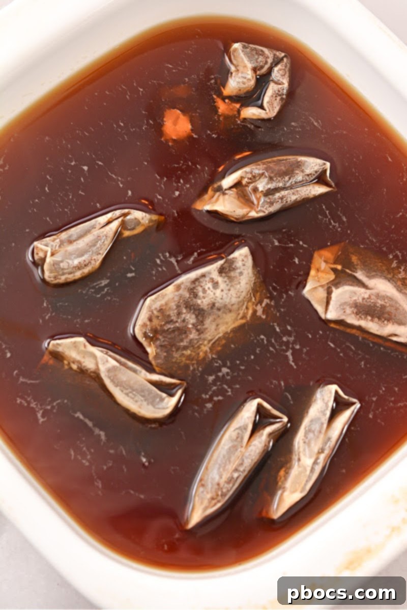 Microwave in operation, brewing the tea.