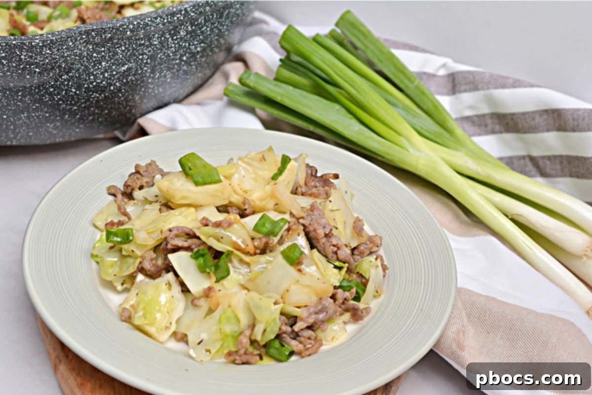 Keto Butter Fried Cabbage With Ground Sausage - Plated Meal