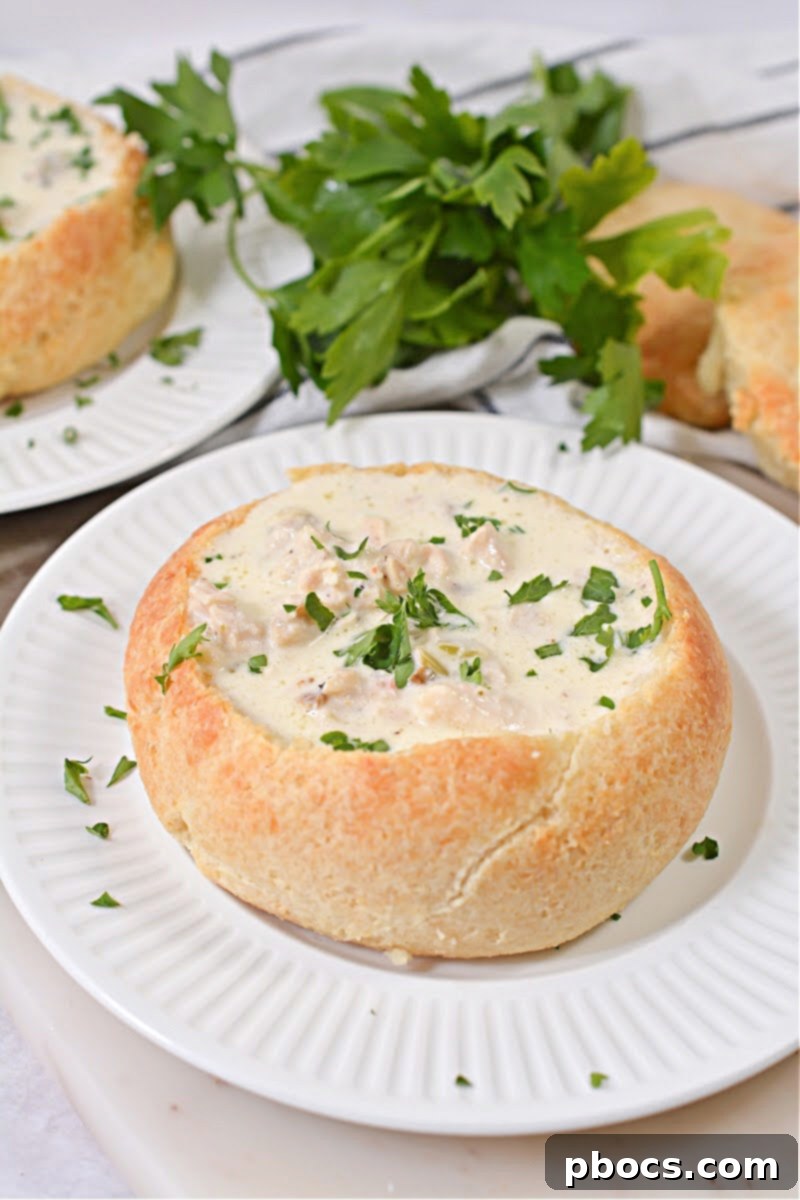 Closeup of a Keto Bread Bowl, showcasing its crusty texture and inviting interior, ready for soup.