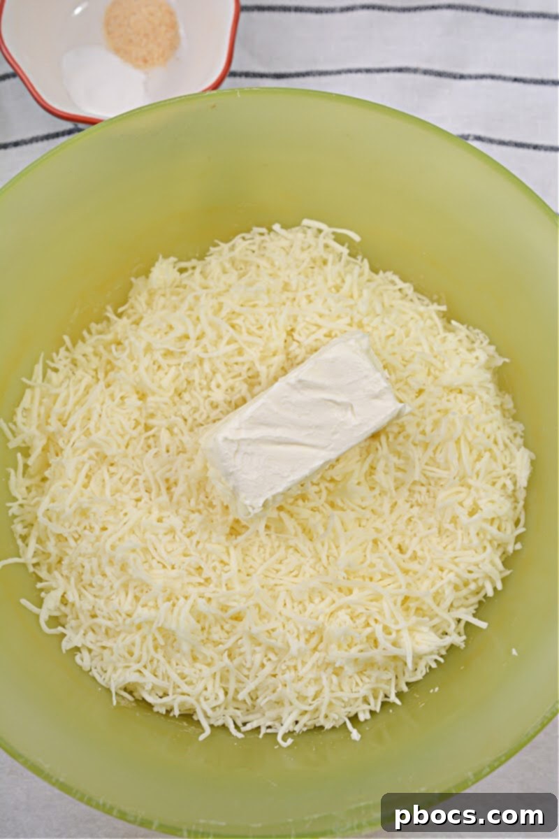 Melted mozzarella and cream cheese mixture, ready to be combined with other dough ingredients.