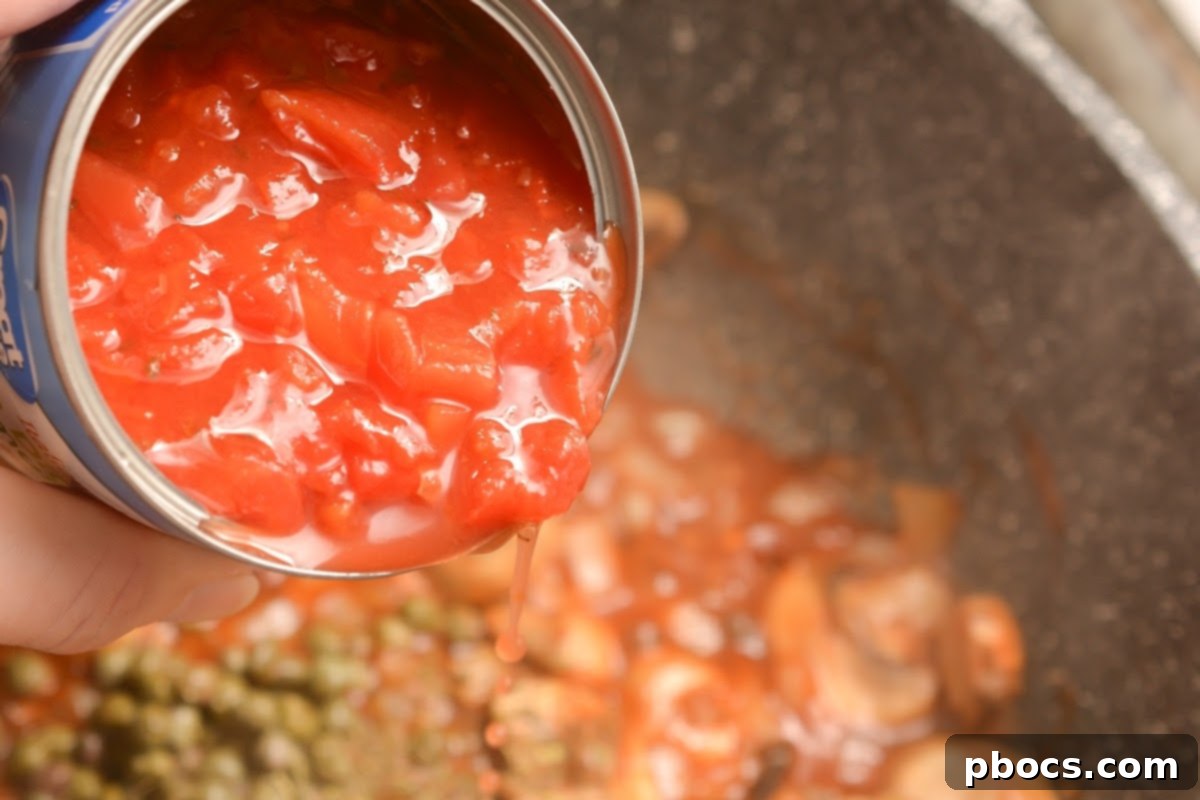 Deglazing the skillet for Keto Chicken Cacciatore