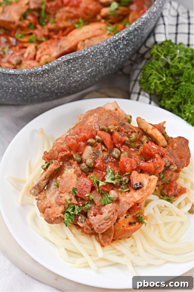 Close-up of Keto Chicken Cacciatore in a skillet