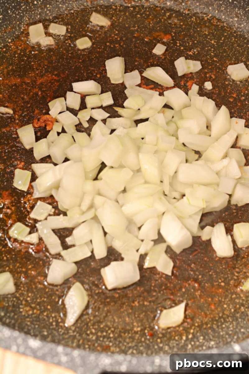Removing excess drippings from the skillet