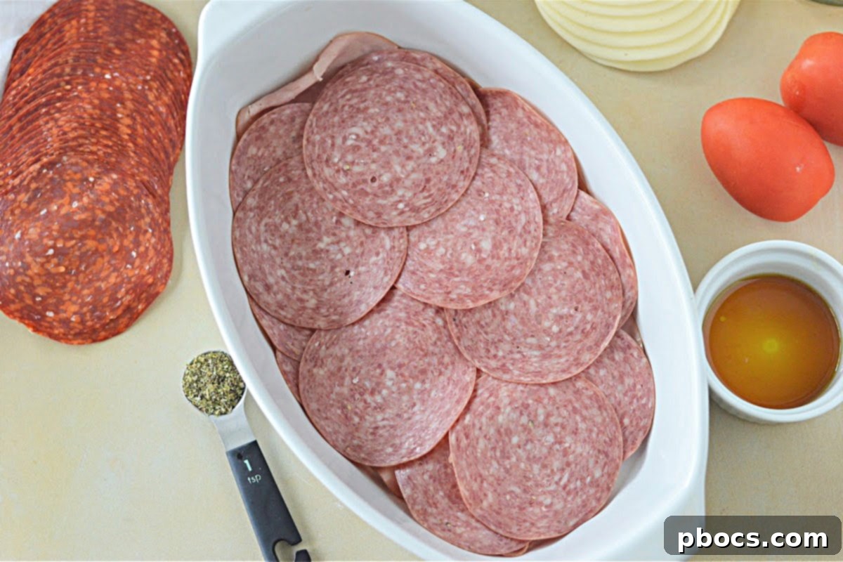 Keto Italian Deli Bake 13 Layering pepperoni over salami