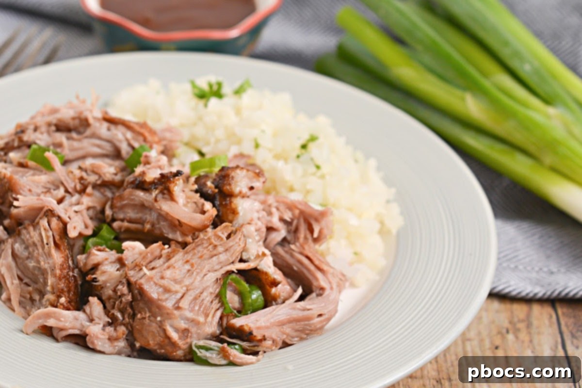 Searing keto brown sugar pork shoulder before slow cooking
