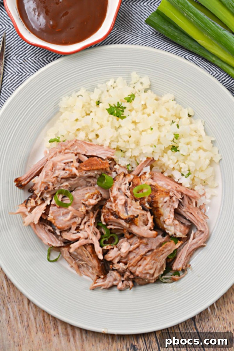 Keto slow cooker pork shoulder cooking in Crockpot