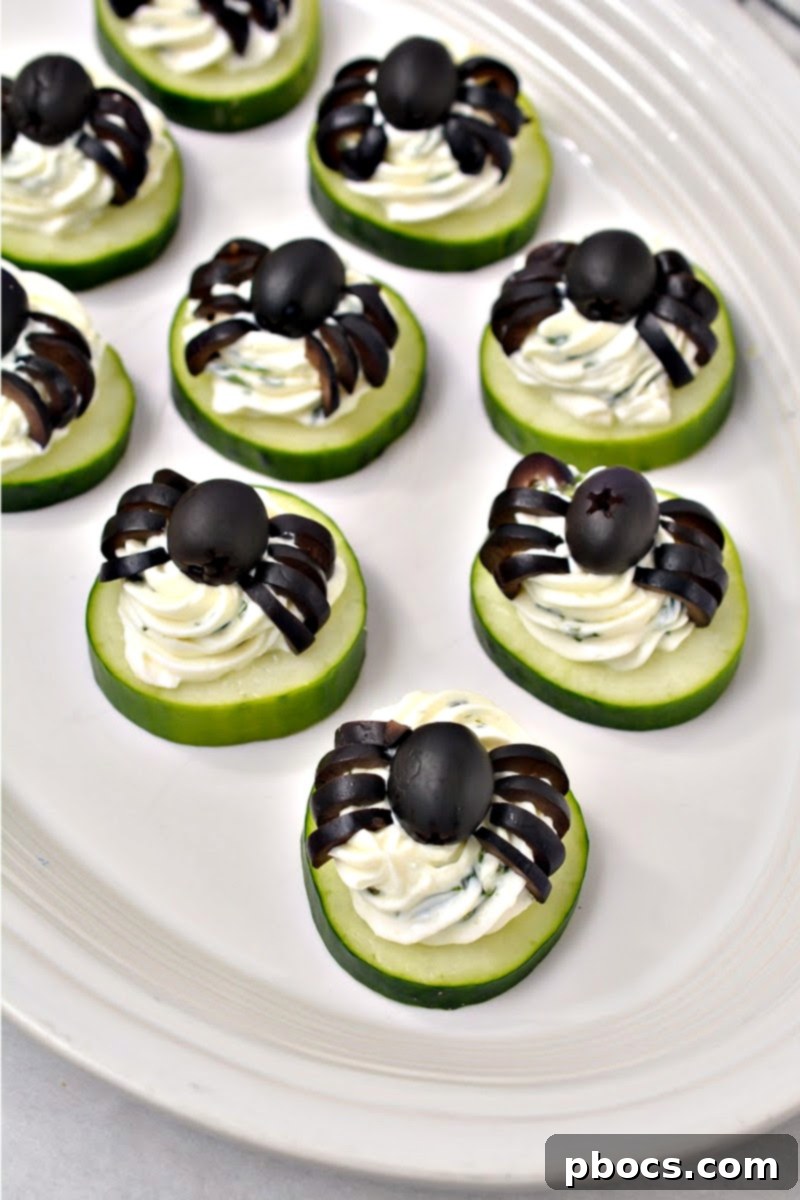 Keto Cucumber Web Bites 7 Platter of Keto Spider Cucumber Appetizer Bites ready to serve at a Halloween party