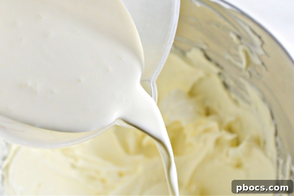 Keto Pumpkin Spice Mousse Cake 11 Step 4: Beating cream cheese and Swerve