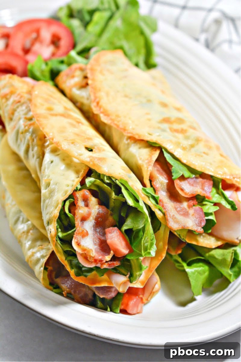 Keto Club Pinwheels 7 Keto Club Sandwich Roll Ups - Plated with keto sides.