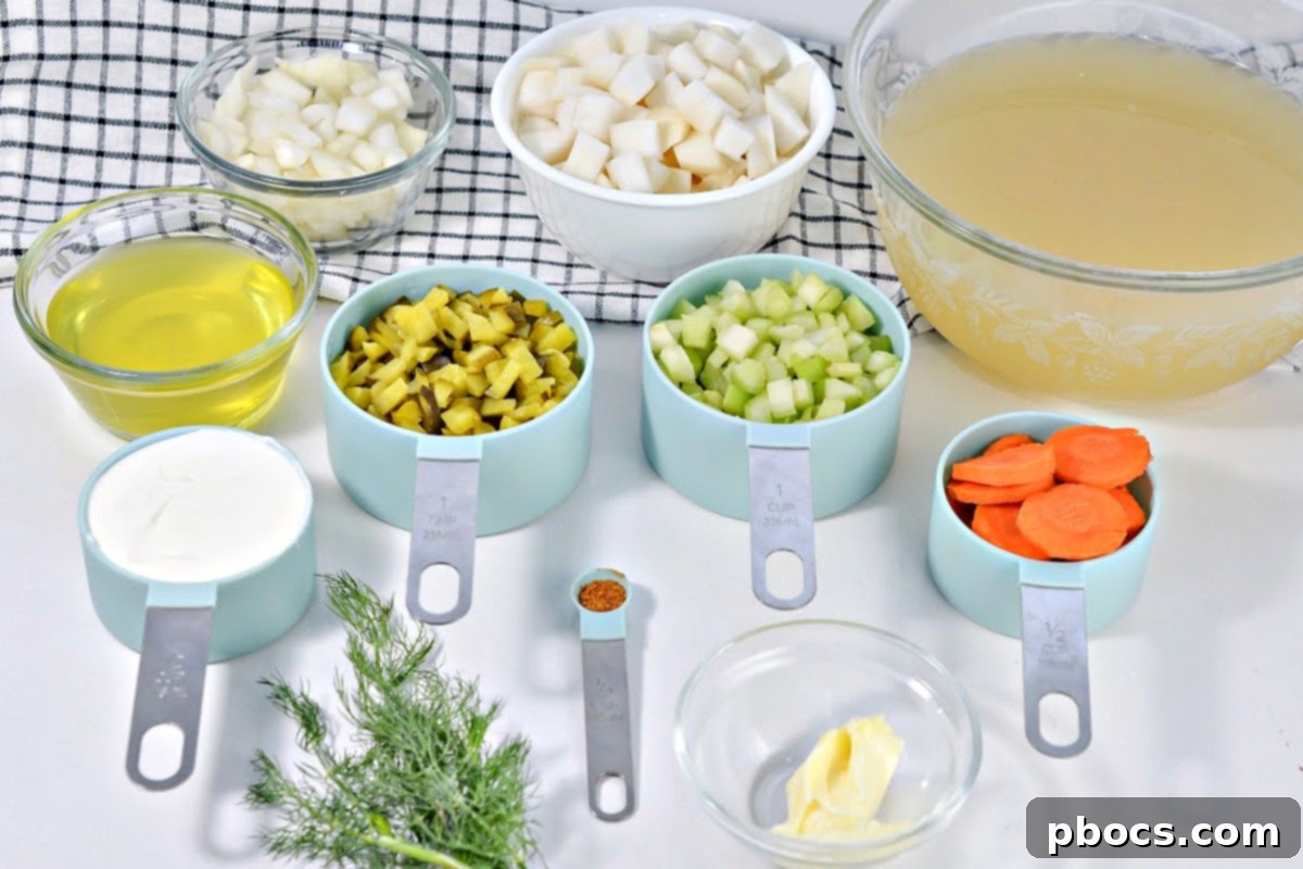 Bowl of low-carb dill pickle soup garnished with fresh dill