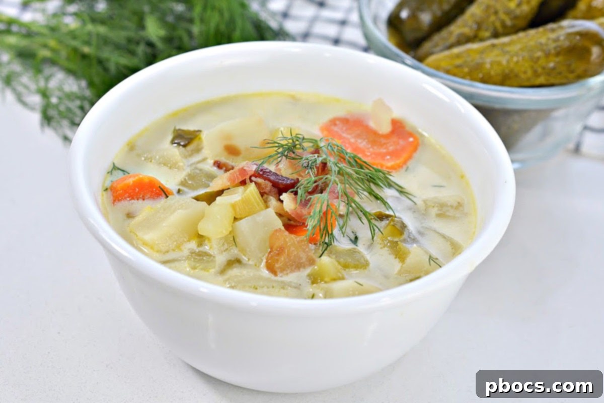 Container of leftover low-carb dill pickle soup in the fridge