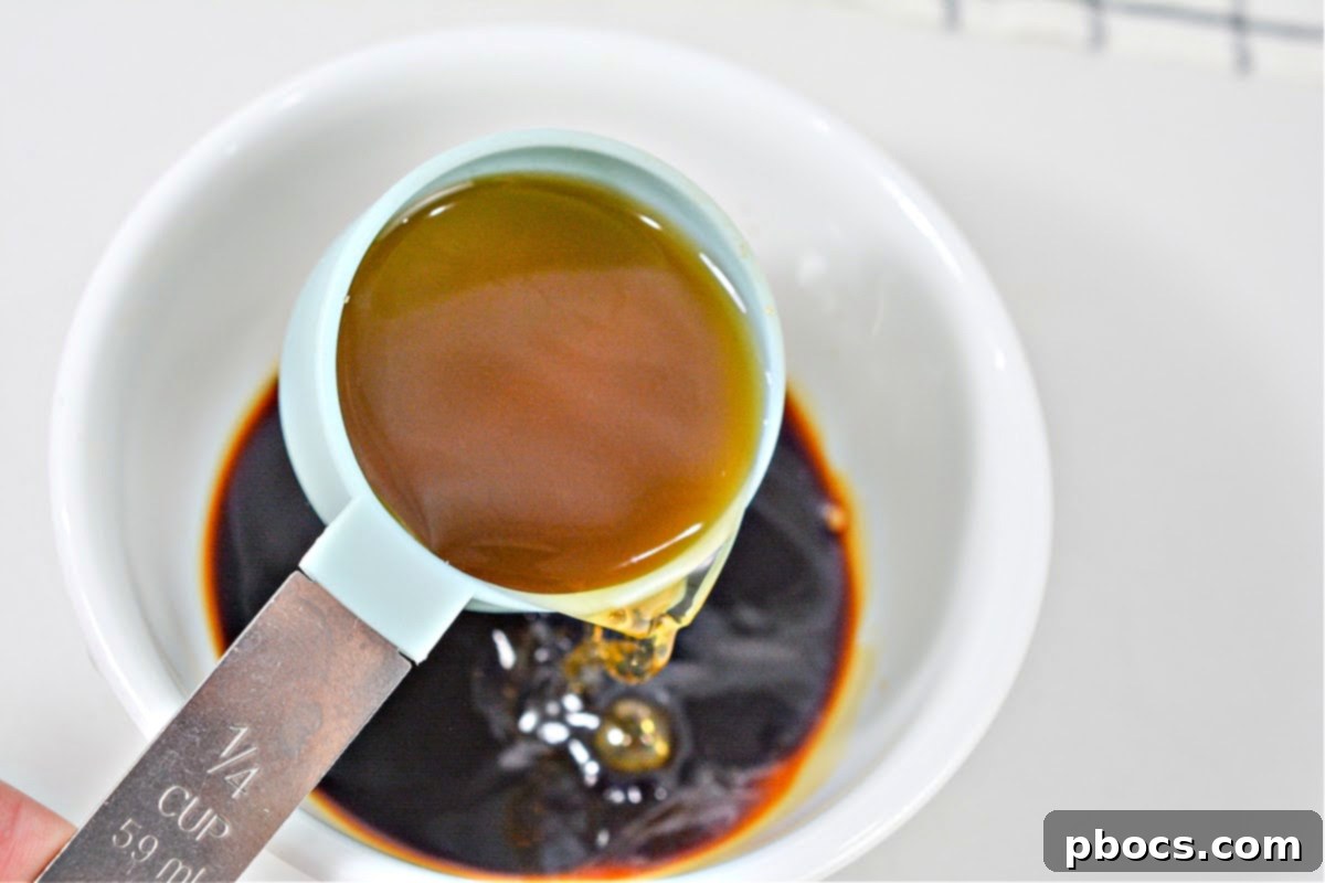 Whisking together the sauce ingredients for Korean Beef Bowl