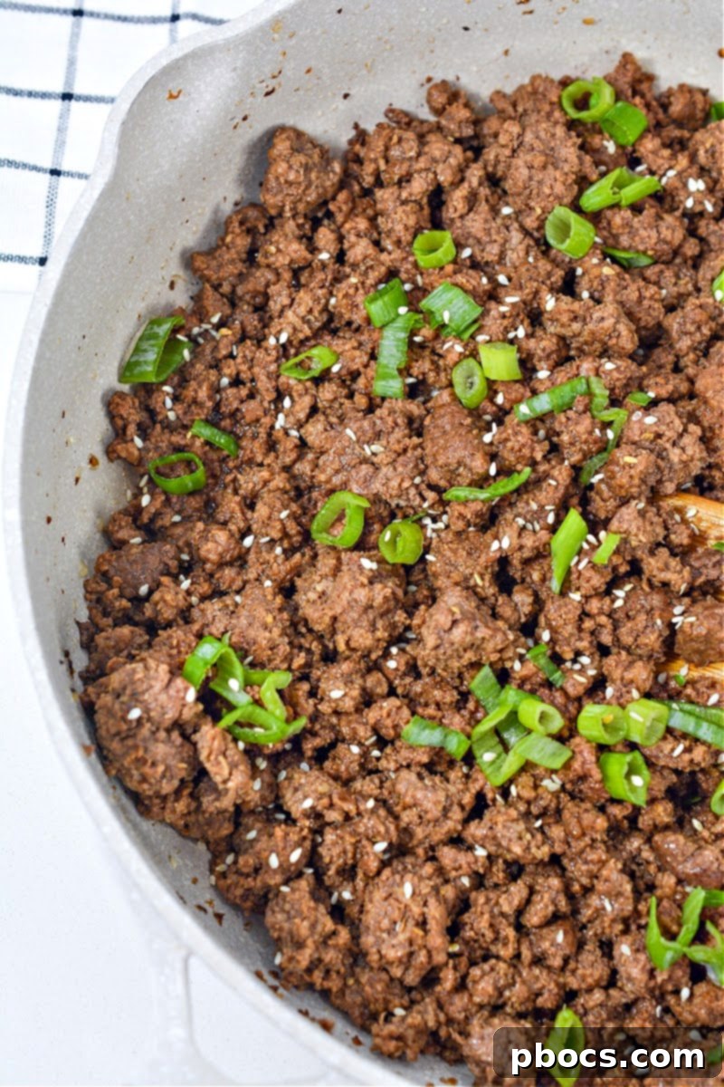 Fresh green onions and sesame seeds ready for garnishing the Keto Korean Beef Bowl