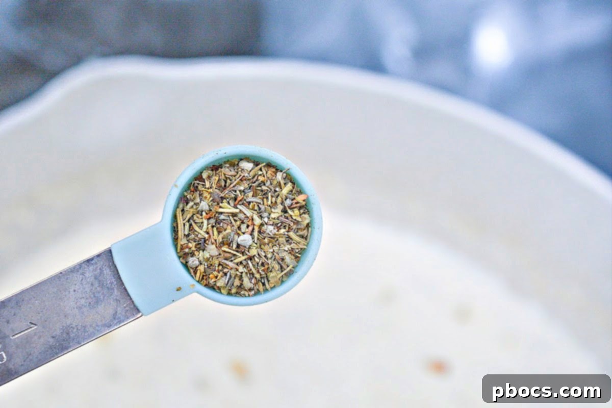 Heavy whipping cream, Italian seasoning, and fresh thyme added to the skillet