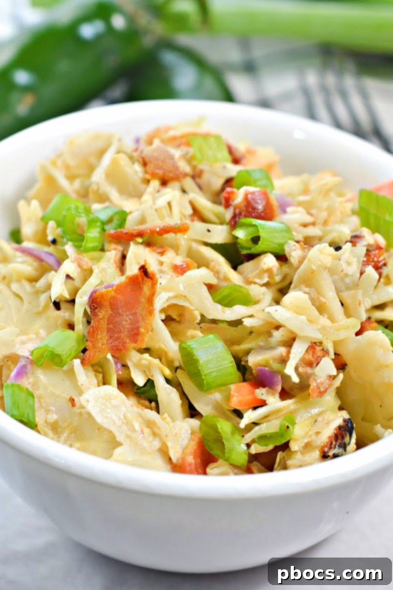 Keto Crack Slaw, a vibrant and spicy chicken and cabbage salad perfect for a low-carb diet.
