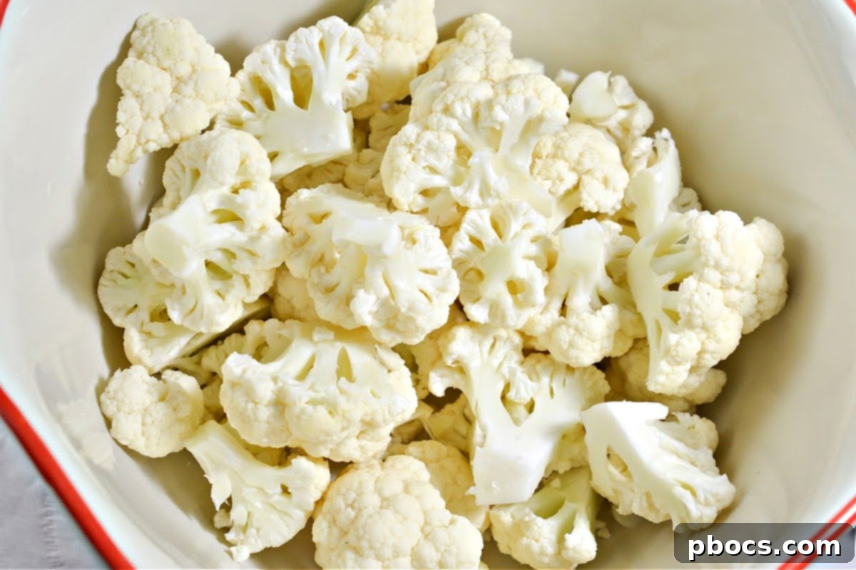 Low-Carb Sheet Pan Sausage and Veggies - Prepping baking sheet with parchment paper