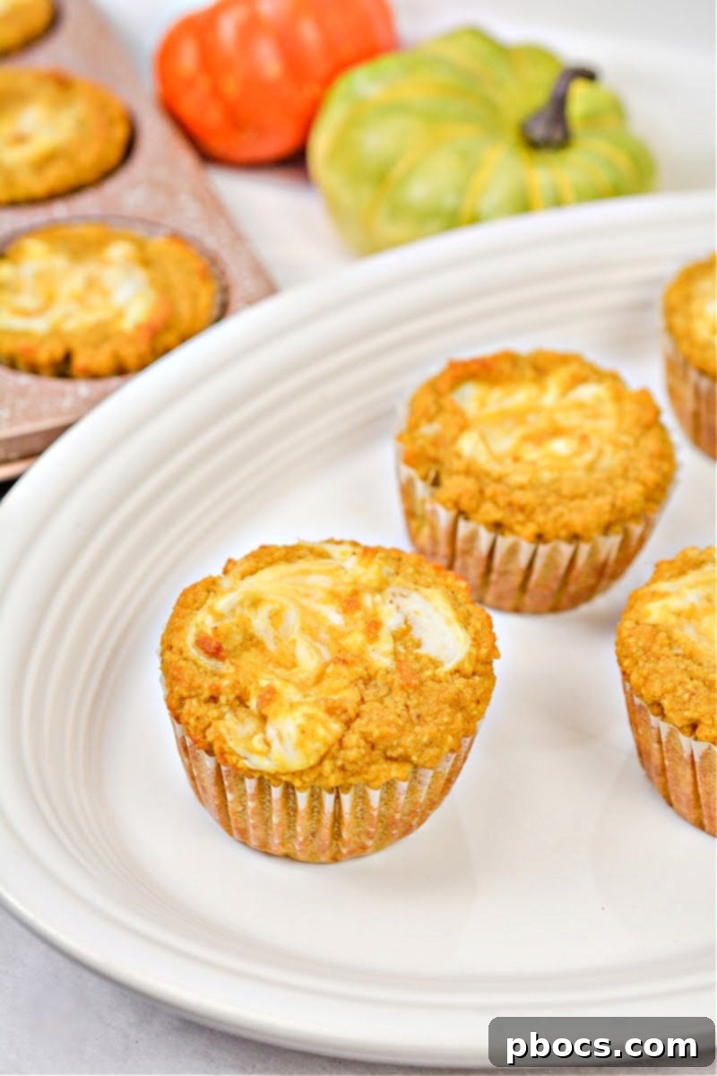 Keto Pumpkin Muffins with Cream Cheese Swirl 2 Delicious Keto Pumpkin Cream Cheese Swirl Muffins