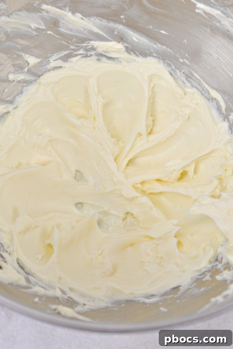 Keto Pumpkin Muffins with Cream Cheese Swirl 11 Preparing the cream cheese swirl mixture for muffins