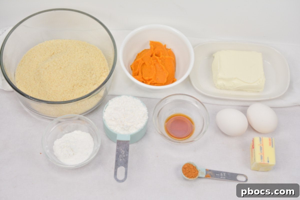 Keto Pumpkin Muffins with Cream Cheese Swirl 6 Mixing the batter for Keto Pumpkin Cream Cheese Swirl Muffins in a bowl