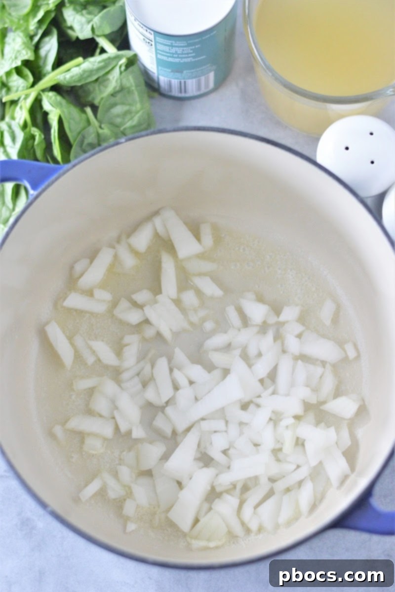 Butter melting in a skillet for creamy keto pumpkin curry soup