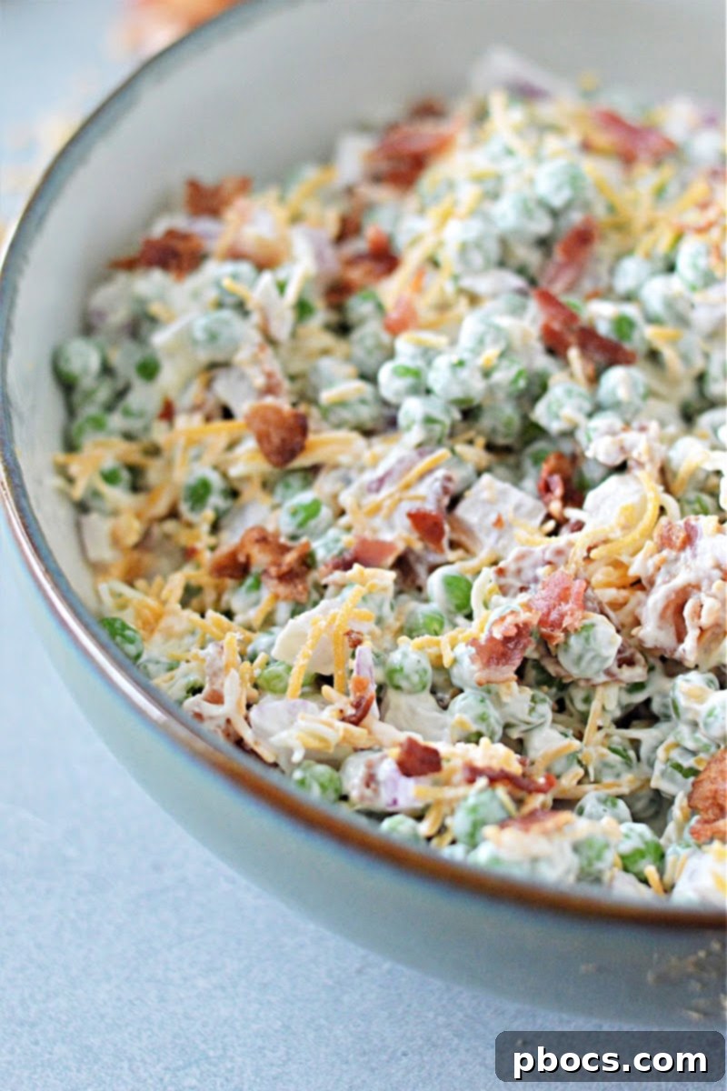 Keto-Friendly Pea Salad Delight 6 Low-Carb Pea Salad chilled in a bowl, ready for serving.