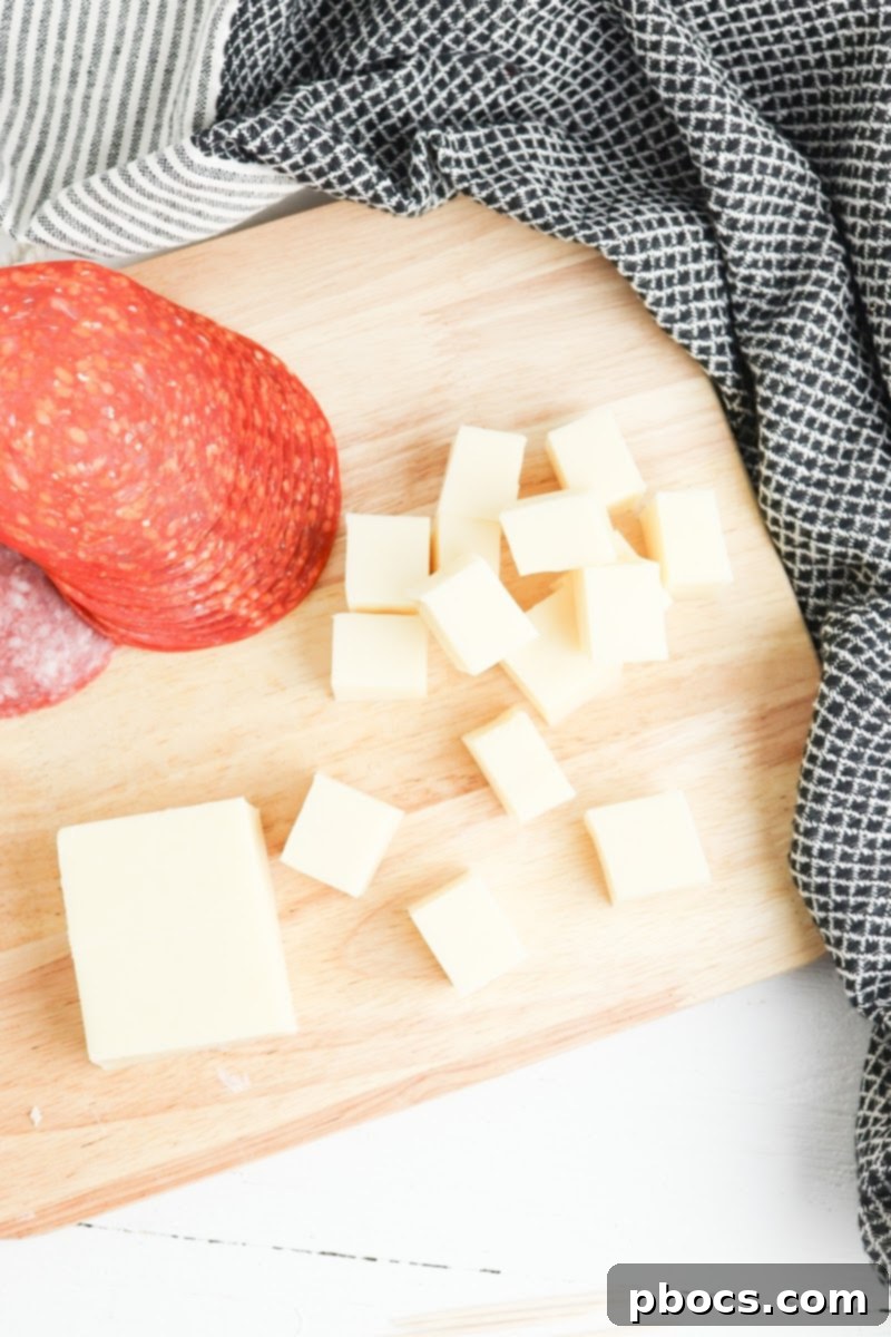 Keto Antipasto Skewers 8 Step 1: Cubing Mozzarella Cheese for Antipasto Bites