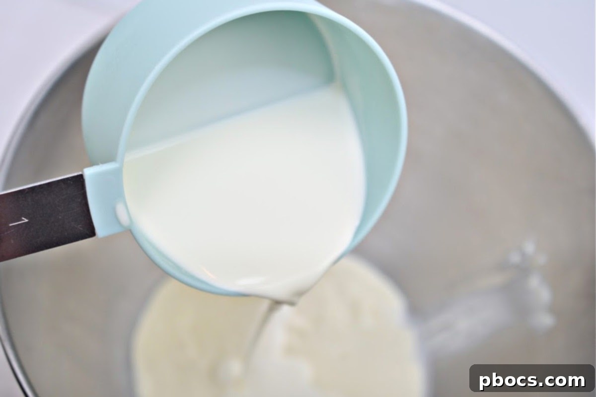 Decadent Keto White Chocolate Christmas Shooters 12 Blending the chilled mixture with more whipping cream until fluffy.