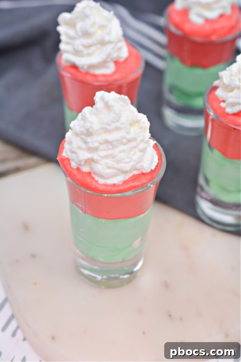 Decadent Keto White Chocolate Christmas Shooters 4 Several Keto White Chocolate Christmas Shooters arranged on a platter, ready for a holiday party.