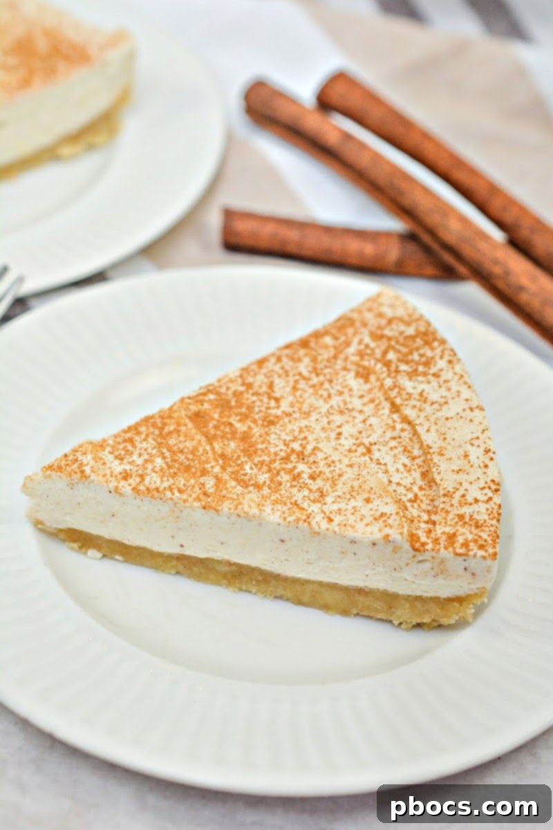 Homemade Keto Eggnog Cheesecake - closeup of a slice