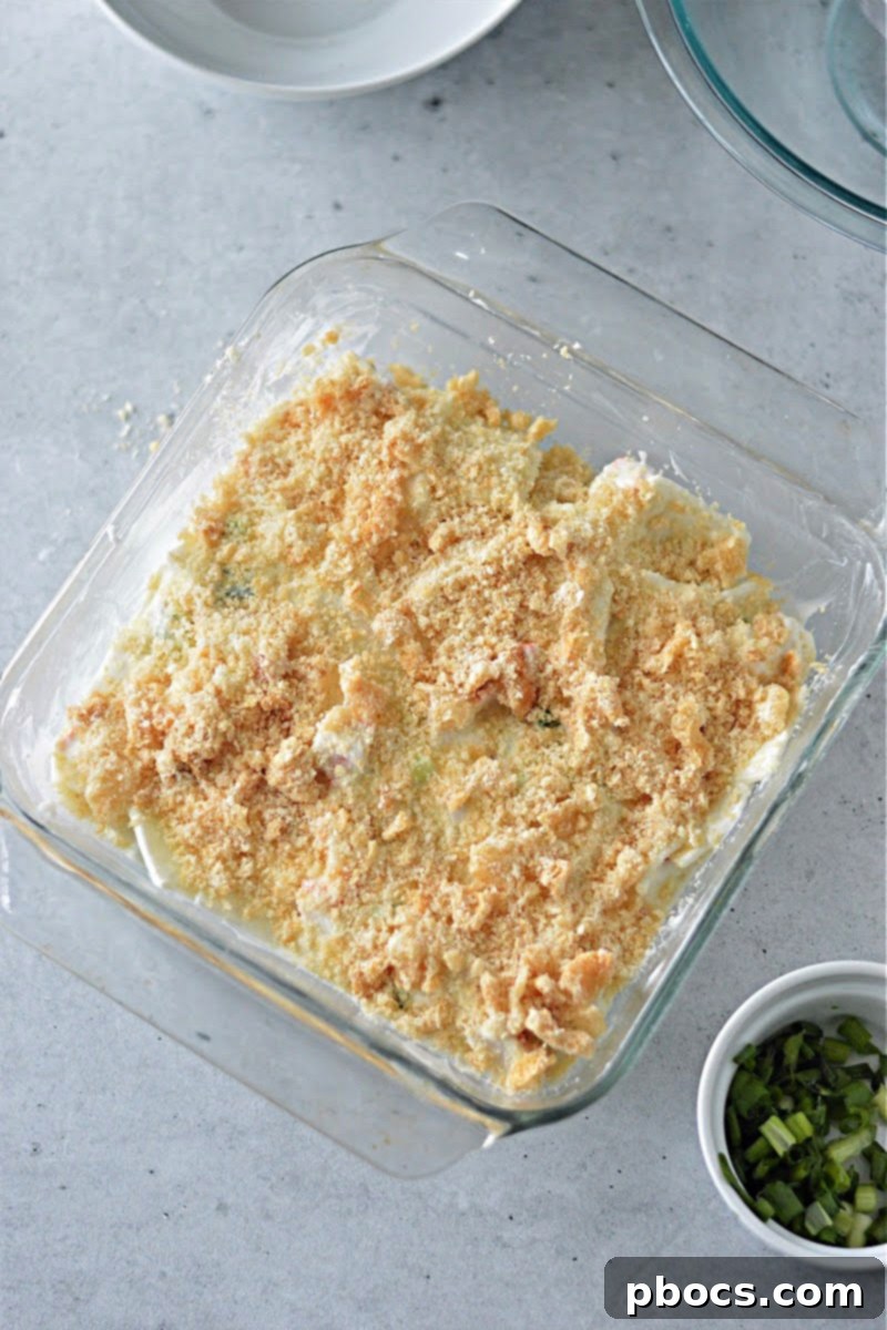 Creamy Keto Crab Rangoon Casserole 15 Topping sprinkled over casserole