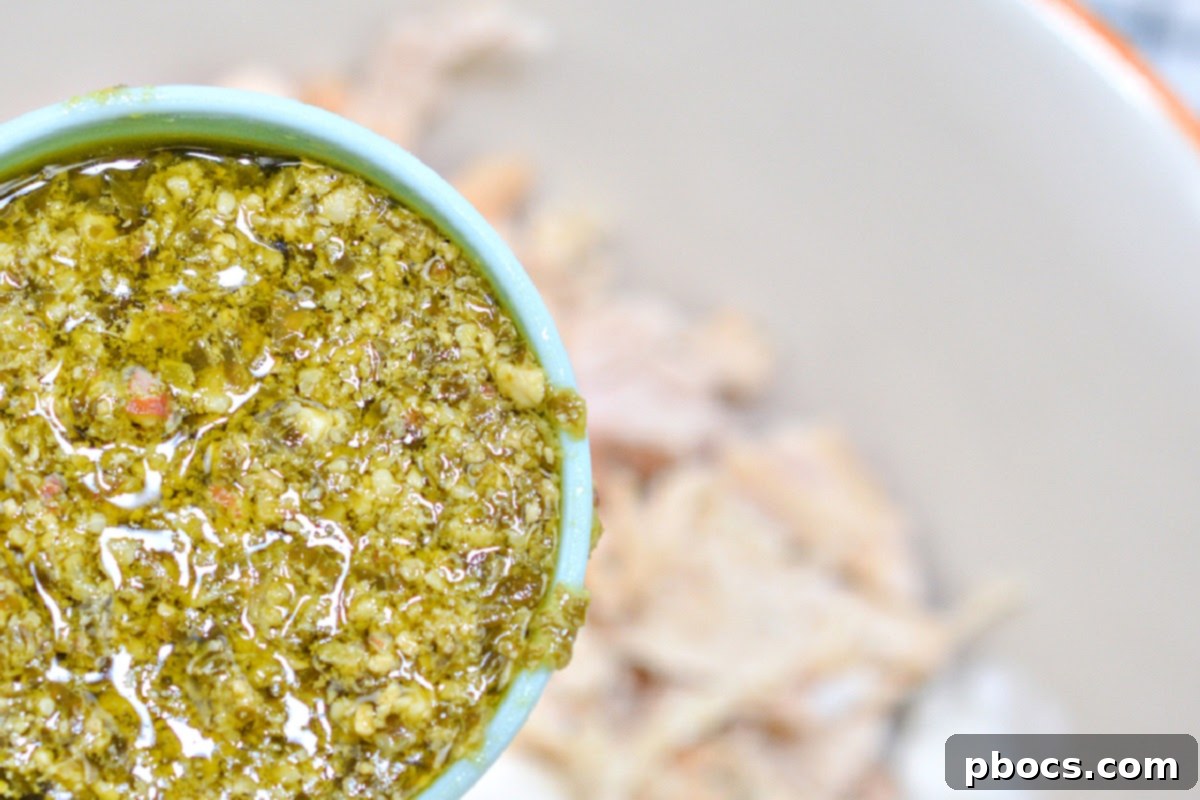 Spreading Chicken Mixture into Casserole Dish