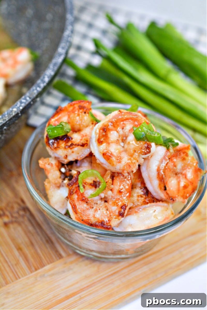 Sticky Honey-Garlic Keto Shrimp 4 Keto Honey Garlic Butter Shrimp with a glistening honey garlic glaze