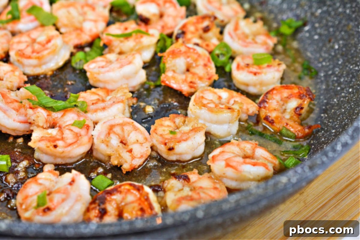 Sticky Honey-Garlic Keto Shrimp 5 Ingredients for Keto Honey Garlic Butter Shrimp laid out on a table
