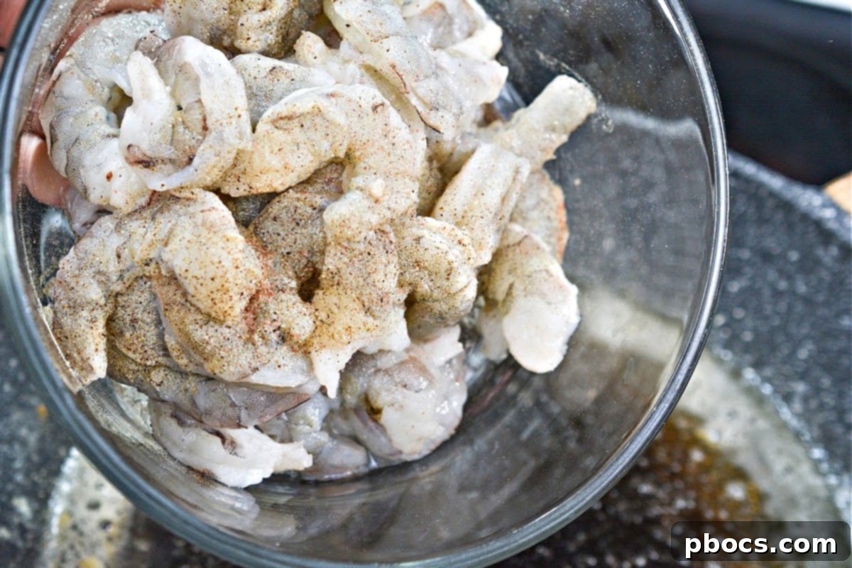 Sticky Honey-Garlic Keto Shrimp 8 Shrimp and garlic sizzling in a skillet