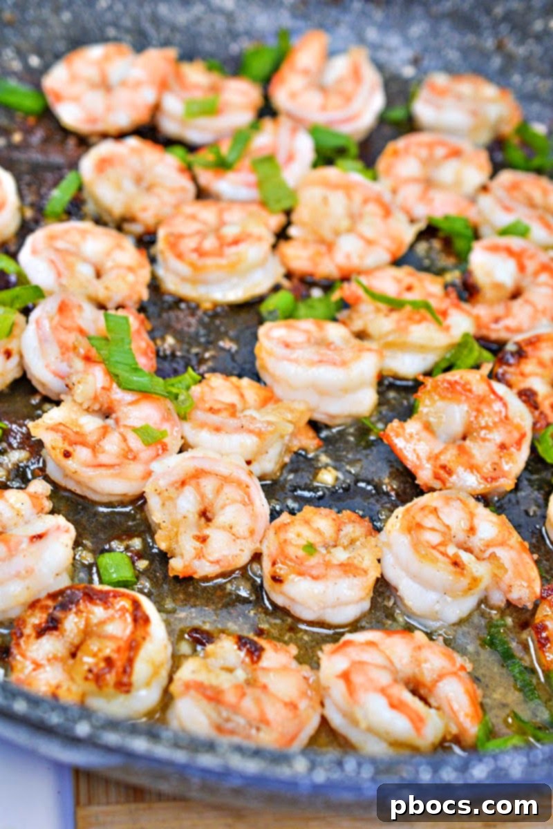 Sticky Honey-Garlic Keto Shrimp 10 Caramelized honey garlic butter shrimp in the pan