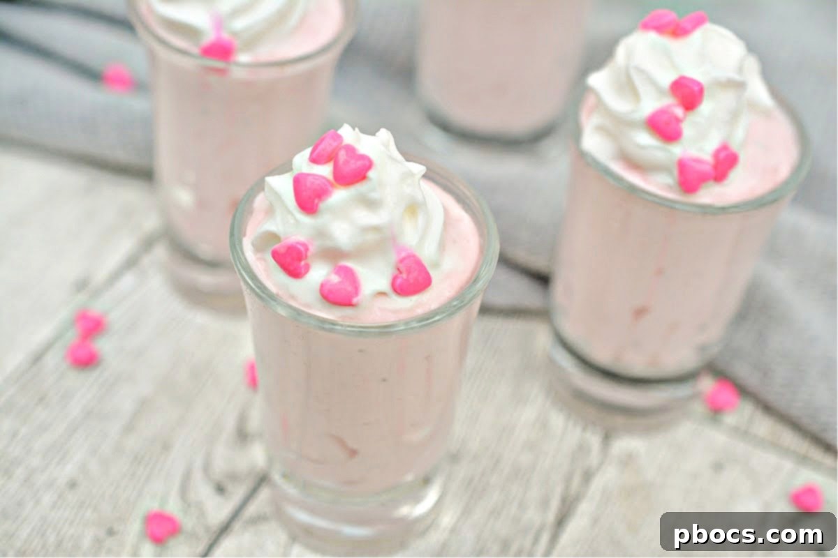 Keto Valentine's Day Shooters - Topped with whipped cream and sprinkles