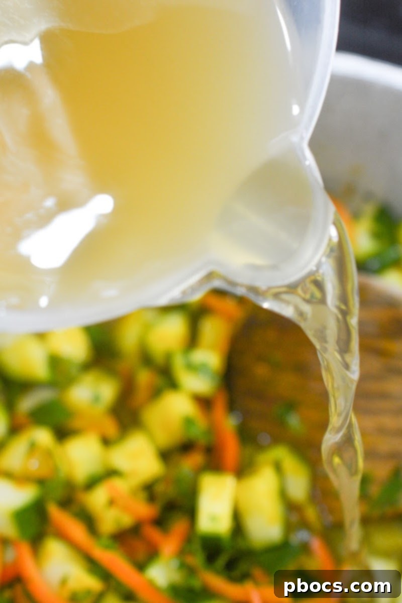 Sunshine Keto Zucchini Soup 9 Keto Turmeric Zucchini Soup - Adding Zucchini and Spices