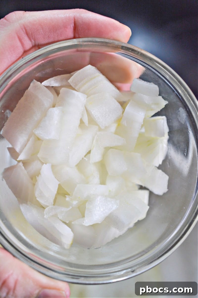 Sunshine Keto Zucchini Soup 7 Keto Turmeric Zucchini Soup - Melting Butter in Pot