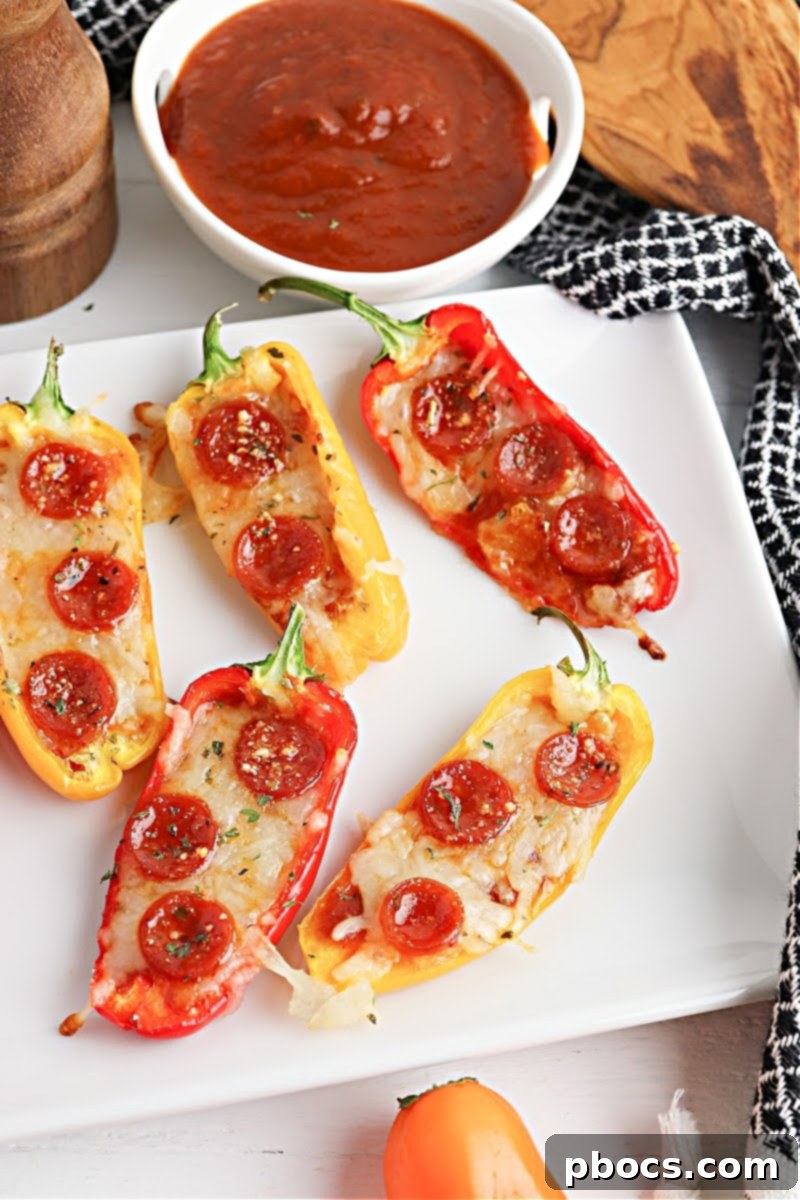 Crispy Low-Carb Pizza Pepper Poppers on a baking sheet, fresh from the oven