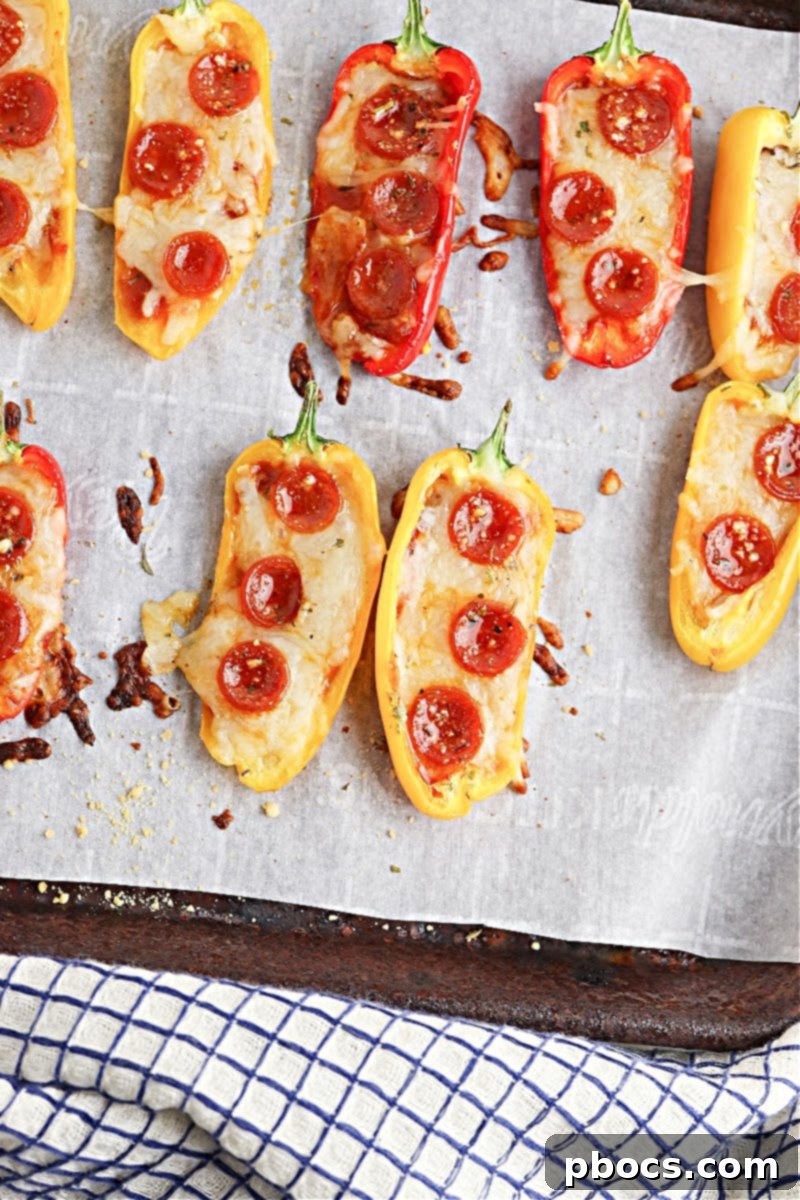 Baked Low-Carb Pizza Pepper Poppers fresh out of the oven, with golden melted cheese